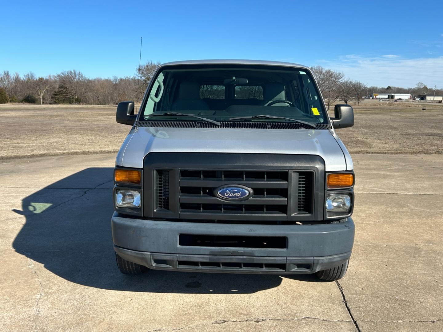 2012 Silver /Gray Ford E-Series Wagon (1FBNE3BL9CD) with an 5.4L V8 SOHC 16V engine, located at 17760 Hwy 62, Morris, OK, 74445, (918) 733-4887, 35.609104, -95.877060 - 2012 FORD ECONOLINE PASSENGER VAN HAS THE 5.4L V8 ENGINE. DEDICATED CNG (ONLY RUNS ON COMPRESSED NATURAL GAS)THIS IS A 12 PERSON PASSENGER VAN, MANUAL SEATS, MANUAL LOCKS, MANUAL, WINDOWS. AMFM STEREO, AUX PORT, FRONT AND REAR AC CONTROL, LEATHER SEATS, ONLY 54,186 MILES, 225/75R16 TIRES. THIS VAN I - Photo#1